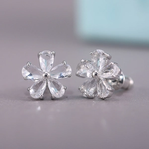 Exquisite silver-colored five-petal flower stud earrings with pear-cut cubic zirconia
