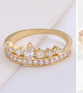Macro shot of 18K gold plated crown ring with water-drop zircon and pave crystals