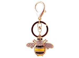 Detailed view of crystal bee keychain with gold plating and enamel yellow stripes