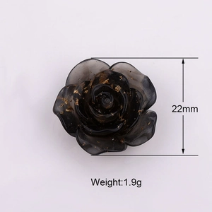 Detail of 22mm dark resin rose charm with gold foil flakes showing size and 1.9g weight