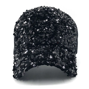 Detailed close-up of shiny black sequins on the visor of this breathable baseball cap