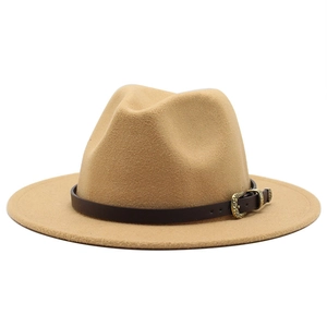 Macro shot of khaki wool fedora featuring dark brown leather band and gold snake buckle