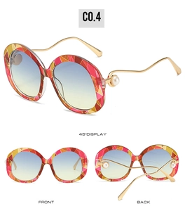 Detailed multi-angle views of trendy sunglasses with pearl-accented golden wavy temples