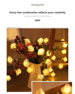 Detail showing soft white rose LED lights wrapped around a white porcelain vase with warm glow