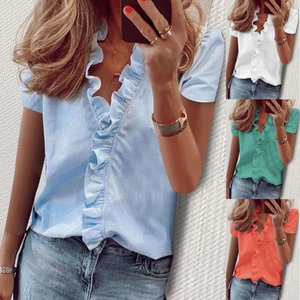 Detail of V-neck short sleeve blouse with ruffle trim in blue, white, teal and coral