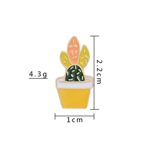 Detailed view of cartoon cactus enamel pin with yellow pot and dimensions labeling