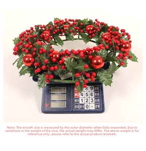 Detail view of artificial Christmas wreath with red berries on an electronic scale for weight