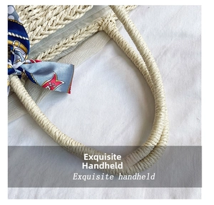 Close-up of woven straw handbag handle with a decorative blue silk scarf detail