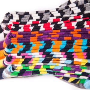 Colorful geometric pattern cotton crew socks featuring stripes and checkered knit designs