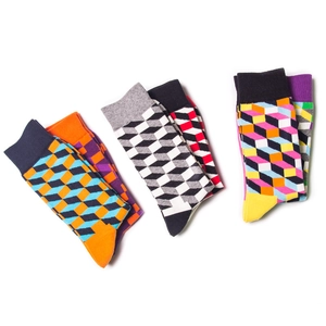 Detailed view of colorful cotton socks featuring geometric patterns and cubic block designs