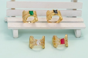 Adjustable gold rings set with colorful square zircon stones and textured metal finish