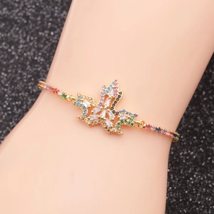 Adjustable copper bracelet featuring colorful zircon maple leaf design on hand model