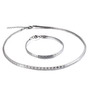 Ensemble collier et bracelet en acier inoxydable argenté avec motifs géométriques