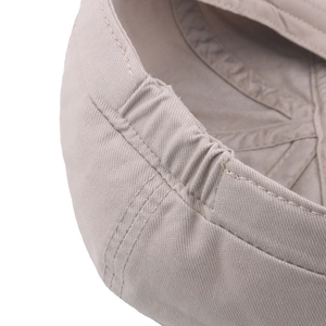 Vue arrière du béret beige en coton avec bande élastique et texture canvas de qualité