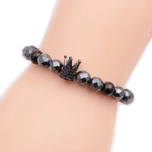 Faceted black hematite beaded bracelet for men with a micro-paved crown charm