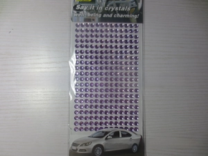 Detail of 3mm purple round acrylic rhinestone stickers for DIY crafts and decor