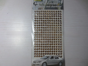 Detail of 3mm amber acrylic gemstone sticker sheet for DIY car decoration and craft