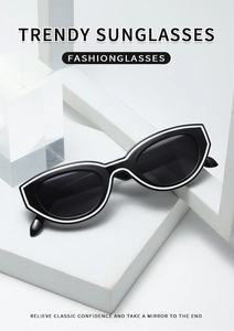 Detail of retro cat-eye sunglasses with black and white frame on geometric blocks