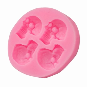 Stampo in silicone rosa con 4 cavità a teschio per cioccolato e dolci di Halloween