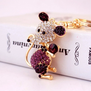 Cute mouse keychain with sparkling white and purple crystals on gold metal plating
