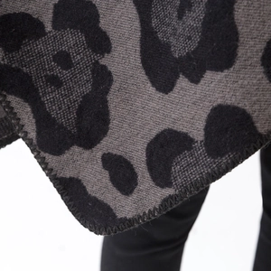 Fashionable leopard print knit shawl with refined stitched edges in black and grey