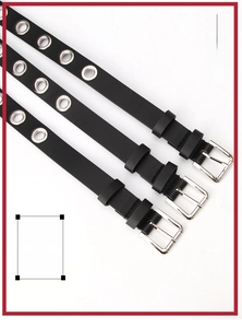 Détail de ceintures en cuir PU noir avec œillets en métal argenté et boucle à ardillon