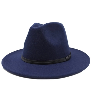 Close-up of deep blue wool felt fedora hat featuring a stylish black leather band detail