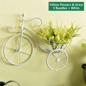 European wrought iron bicycle wall-mounted flower basket with three yellow artificial flowers