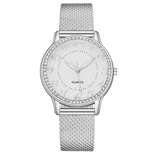 Luminous quartz watch for women featuring a silver mesh band and rhinestone bezel