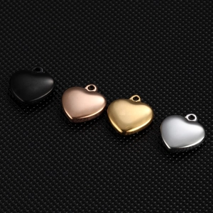 Polished 14mm heart-shaped stainless steel pendants in black, rose gold, gold, and silver