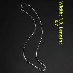 Polished silver curb chain 3.7mm width and 1.0mm thickness on black background