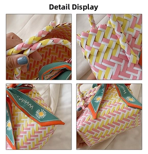 Detail of colorful woven straw handbag with pink and yellow textures and floral ribbon
