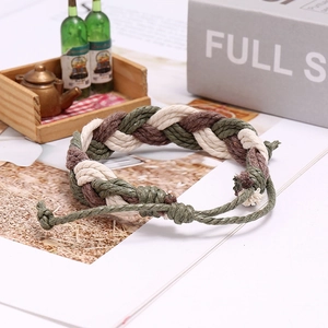 Close-up of hand-woven rope bracelet in olive green and brown with adjustable knot