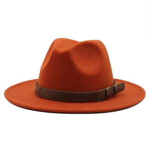 Terracotta wide brim wool fedora hat with brown stitched leather band on white background