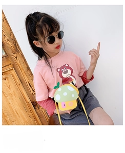 Detailed view of pink long sleeve Lotso t-shirt with a yellow mushroom shoulder bag