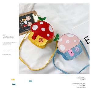 Flat lay detail of cute mushroom-shaped crossbody bags for kids in colorful PU leather