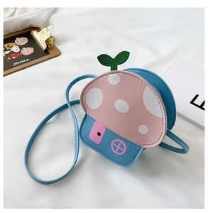 Detail of mushroom house shaped kids crossbody bag with sky blue PU leather and pink roof