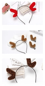Detailed view of plush reindeer antler headbands in red, brown, and leopard print patterns