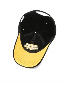 Detail of internal embroidery Force label and yellow brim on black baseball cap