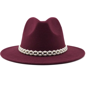 Detail view of burgundy wool fedora featuring a decorative double-layer pearl band