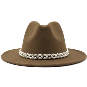 Detail of elegant brown wool fedora hat featuring a luxury pearl bead decorative band