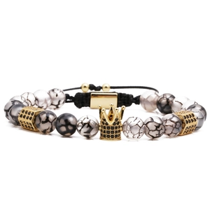 Beaded crown bracelet with black and white dragon vein stones and golden zircon crown