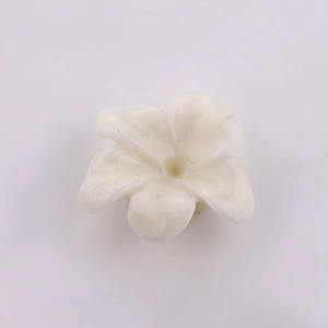 Detailed view of a white 3D resin flower accessory for DIY jewelry and phone cases
