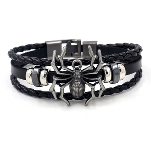 Men's retro braided leather bracelet with silver spider pendant and metallic rivet accents
