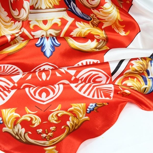 Red baroque silk scarf with gold patterns and classic scrolling floral textures