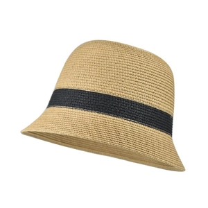 Macro view of women's straw bucket hat with black ribbon detailing for sun protection