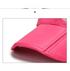 Detail of rose red sun hat brim featuring a built-in sandwich structure for stable shaping