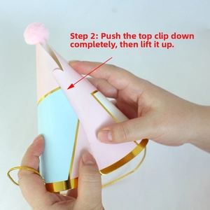 Step-by-step guide showing how to assemble the paper party hat buckle with pompom top