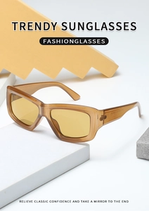 Close-up of translucent brown square frame sunglasses with trendy yellow lenses