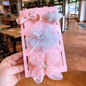 Detailed set of four baby headbands and clips with pink mesh bows and floral lace